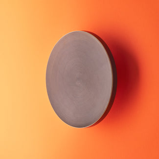 Larger Helios rechargeable wall light in bronze