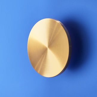 Larger Helios rechargeable wall light in brushed gold aluminium