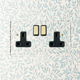 Lucian perspex double socket in clear perspex with black inserts and aged brass switch