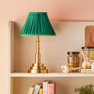 Ernest rechargeable table lamp with an antiqued brass finish