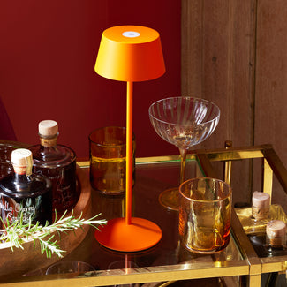 Scoon rechargeable table lamp in orangeade