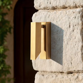 Andor IP54 adjustable wall light in brass