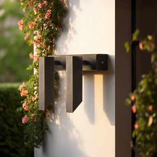 double Andor IP54 adjustable wall light in bronze