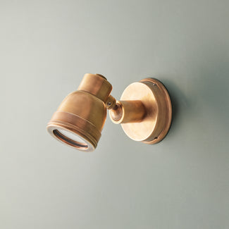 Cellato IP54 wall light in brass