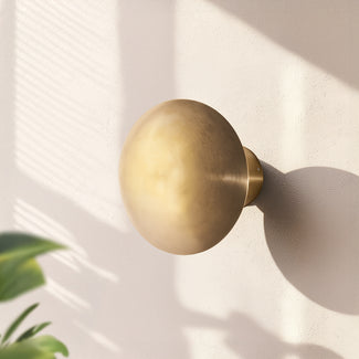 Eden IP65 wall light in brass